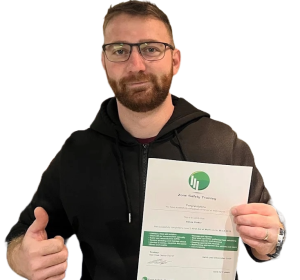 Man smiling with thumb up with zone safety training certificate.